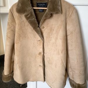 “Suede look”  jacket  with fur lining and cuffs.